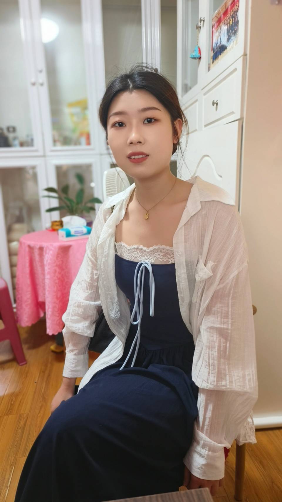 梁女士